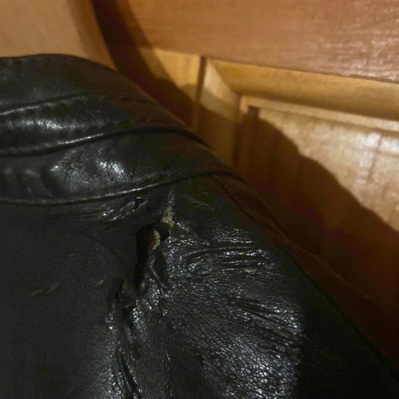 faux leather jacket. Smrepairable blemish/ separation top back neck - Picture 5 of 5